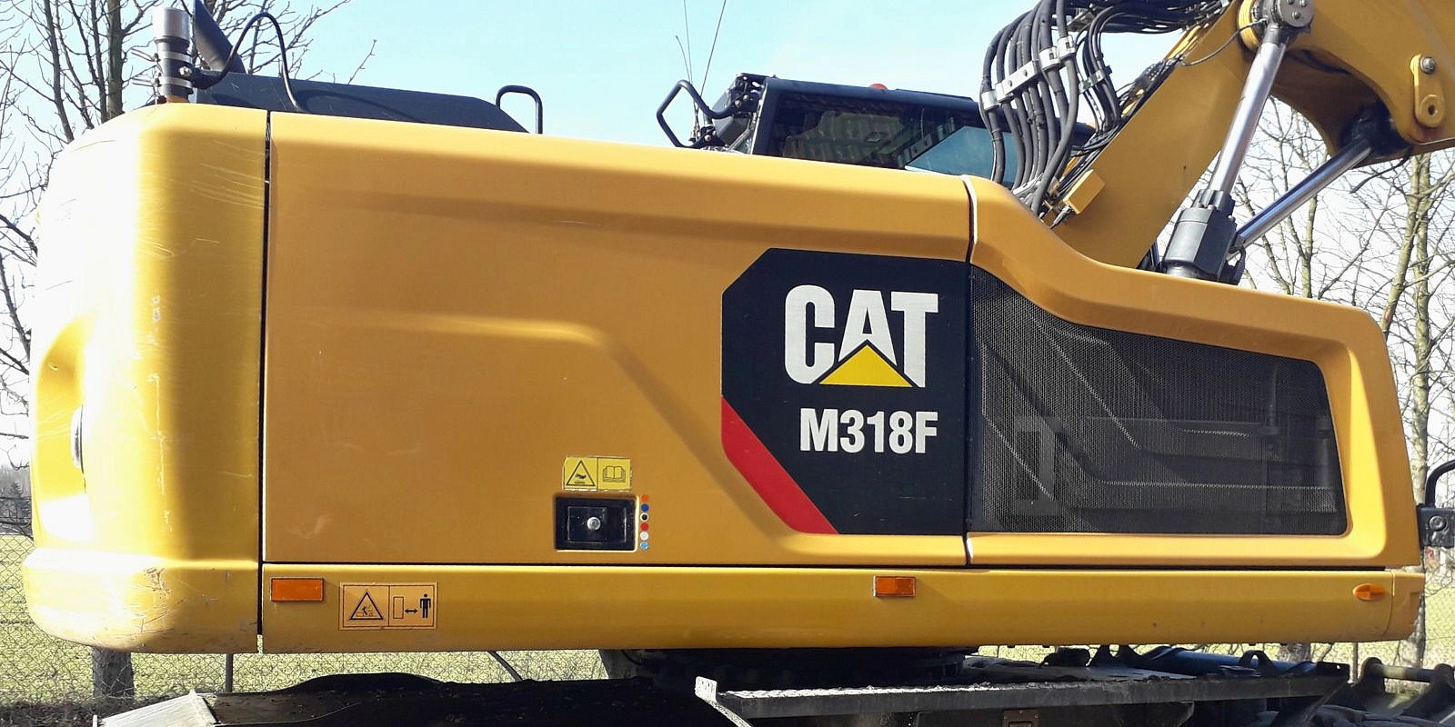 Kolový bagr Cat M318F